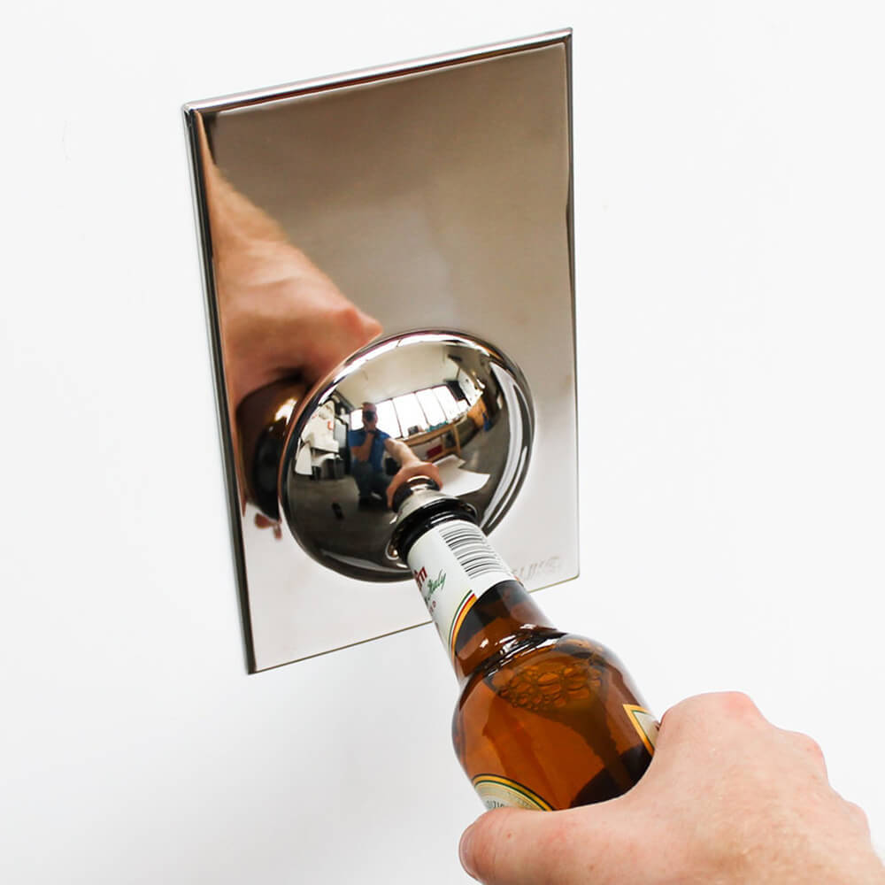 Wall mounted bottle opener