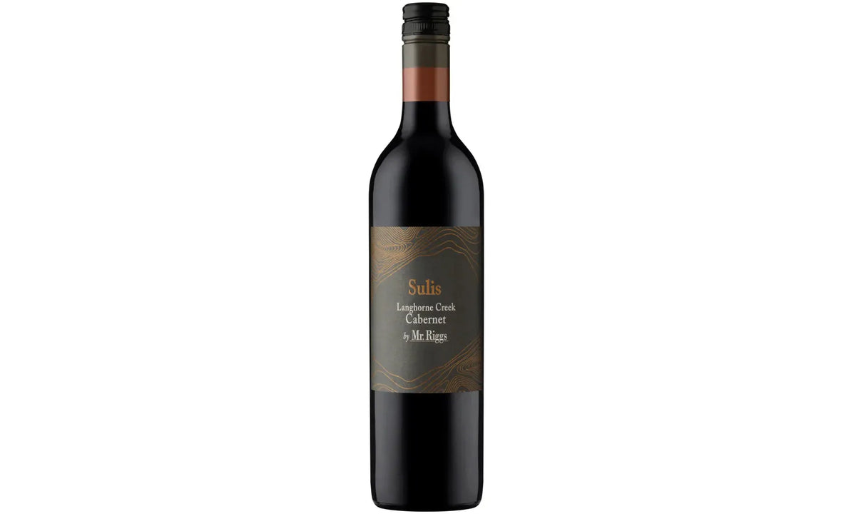 Red wine bottle with a label on a white background